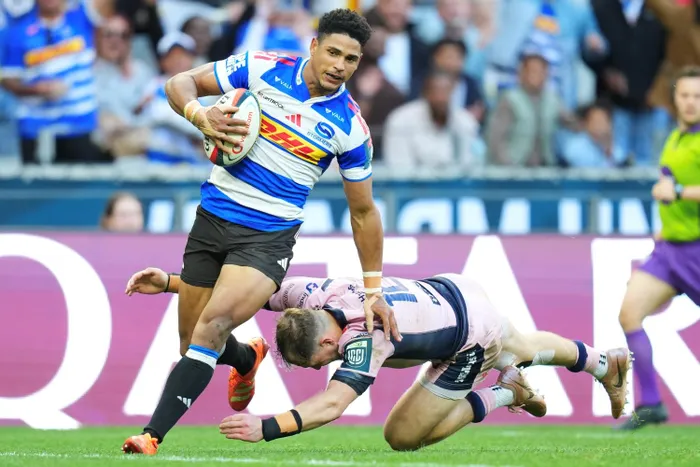 Stormers flyhalf Sacha Feinberg-Mngomezulu on his way to score his try before injuring himself in the URC quarter-final victory over Cardiff on Saturday in Cape Town.