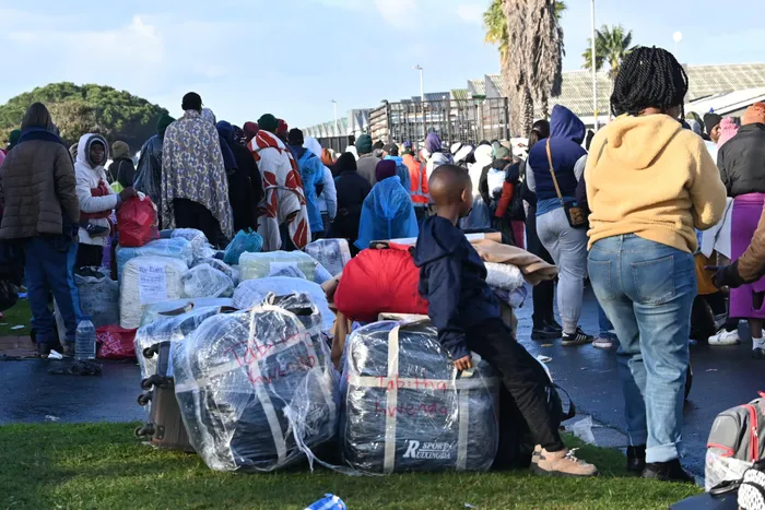 Cold, hungry and fearful, thousands of Zimbabweans are waiting in Cape Town to return home before planned protests.