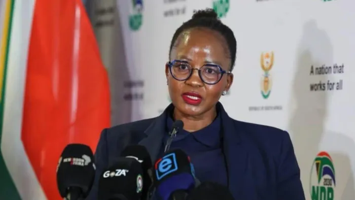 National Treasury Deputy Director-General Ogalaletseng Gaarekwe addressing the media after the department announced the withholding of equitable share transfers to 69 municipalities in an effort to instill fiscal discipline.