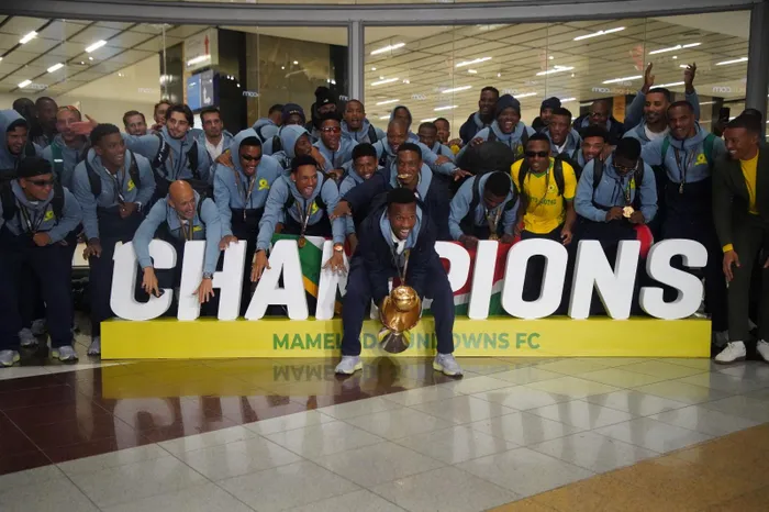 Mamelodi Sundowns arrived at OR Tambo International Airport late on Monday night to rapturous celebrations, after winning their second CAF Champions League title. Photo: Oupa Mokoena Independent Media