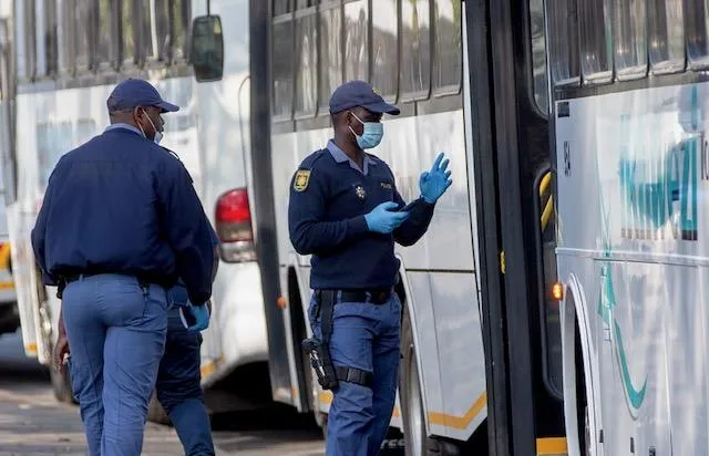 Police inspected buses at the Old Drive-In site in Durban as authorities monitored movement of repatriated foreign nationals, with transport operations continuing in batches throughout the busy coordination hub Monday.