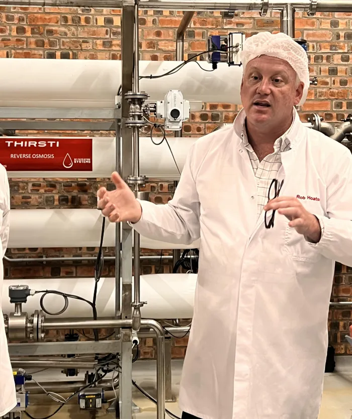 Thirsti Water founder  Rob Hoatson shows journalists how the bottling process works during a media tour of the company’s new water plant in Tulbagh.