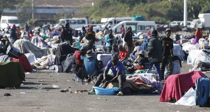 Thousands of Malawian foreign nationals, seeking refuge at the Durban drive-in site on North Beach, are going about their business, doing their laundry, shaving their hair, and selling food and other accessories, while others take advantage of Durban's warm weather, basking in the sun, waiting for their repatriation processes