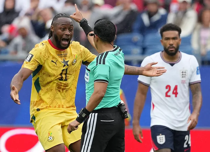 Ghana forward Antoine Semenyo argues with referee Said Martinez during their Group L Fifa World Cup match against match England.