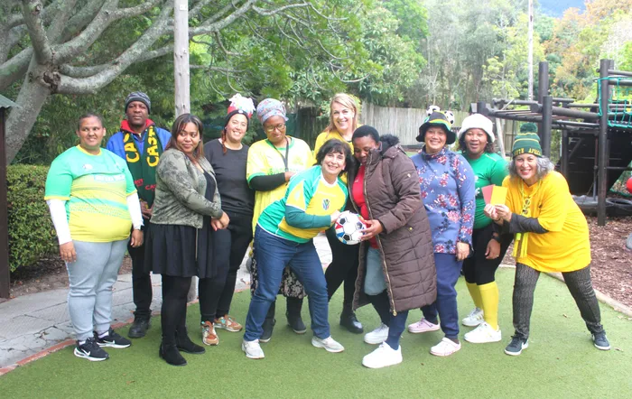 The Hill Pre-Primary teachers all dressed up in their football gear to celebrate the opening of the football World Cup.