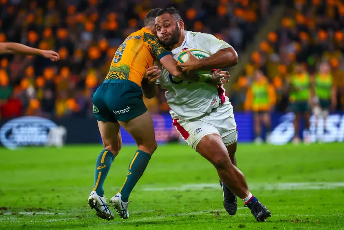England's Billy Vunipola is tackled by Australia's Nic White during their International rugby union match at Suncorp Stadium in Brisbane on Saturday