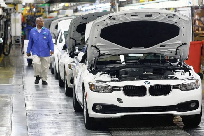A BMW assembly plant. BMW SA said dealership "consolidation is the name of the game".Photo: Bloomberg
