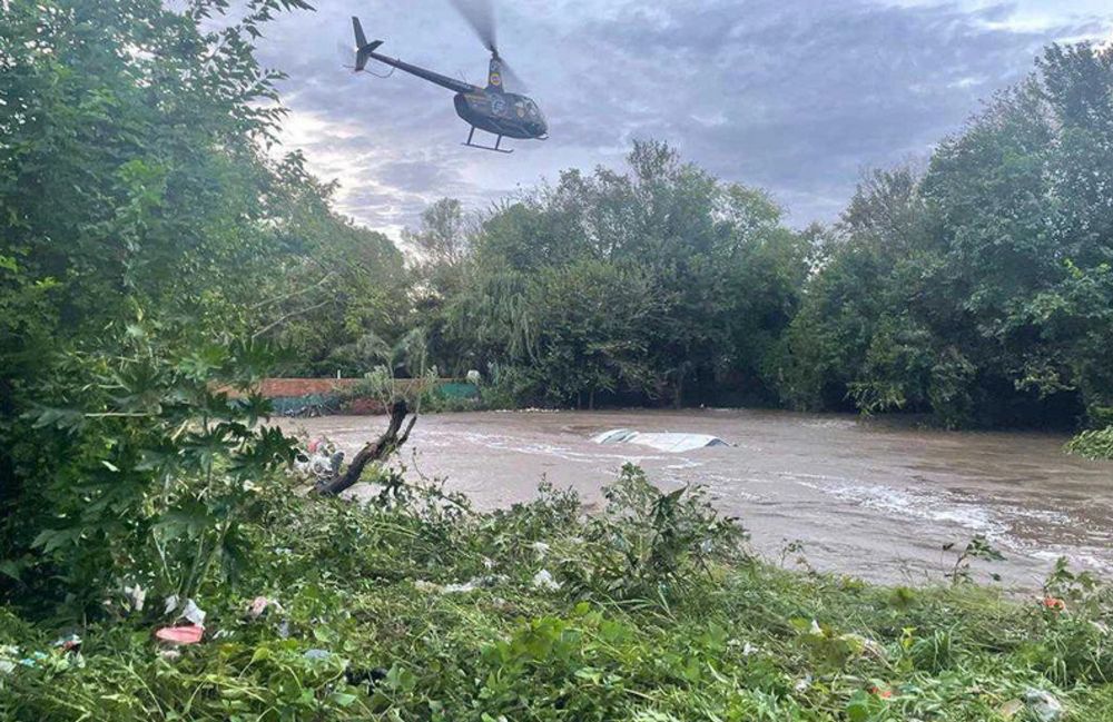 Narrow escape for family of three as car is swept into river in Centurion