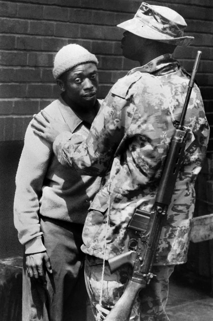 A soldier arrests a demonstrator in Soweto on June 16, 1976, during a students protest against having to use Afrikaans language at school.