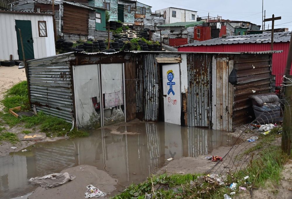 Six dead as Cape Town floods and storms devastate communities
