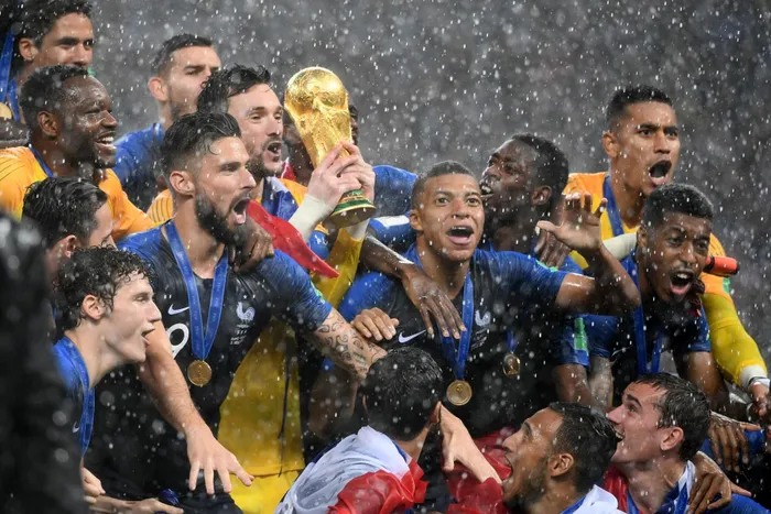 France's players lift the Fifa World Cup trophy after the Russia 2018 World Cup final football match between France and Croatia at the Luzhniki Stadium in Moscow on July 15, 2018.