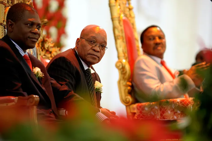 A 2009 file photo showing then-Gauteng premier Paul Mashatile sitting with then-ANC president Jacob Zuma shortly before Zuma spoke at the International Pentecostal Holiness Church (IPHC) on his 67th birthday. Next to Zuma is the church's the- leader Reverend Glayton Modise. File picture: Jennifer Bruce