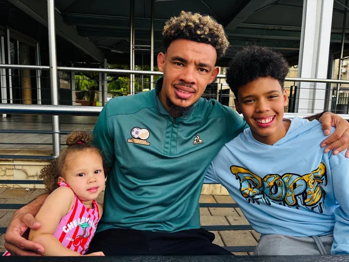 Ronwen Williams with his children Mila and Mikyle