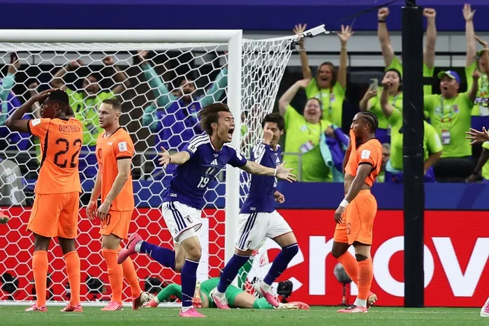 Japan's forward Koki Ogawa celebrates his team's second goal during the 2026 World Cup Group F football match between the Netherlands and Japan at the Dallas Stadium in Arlington on June 14, 2026.