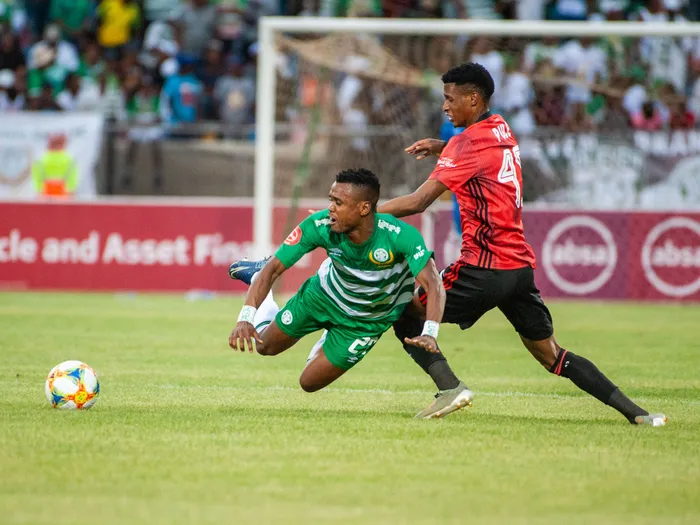 Harris Tchilimbou of Bloemfontein Celtic and Vincent Pule of Orlando Pirates during the Absa Premiership 2019/20 game at Dr Molemela Stadium in Bloemfontein. Photo: Frikkie Kapp/BackpagePix