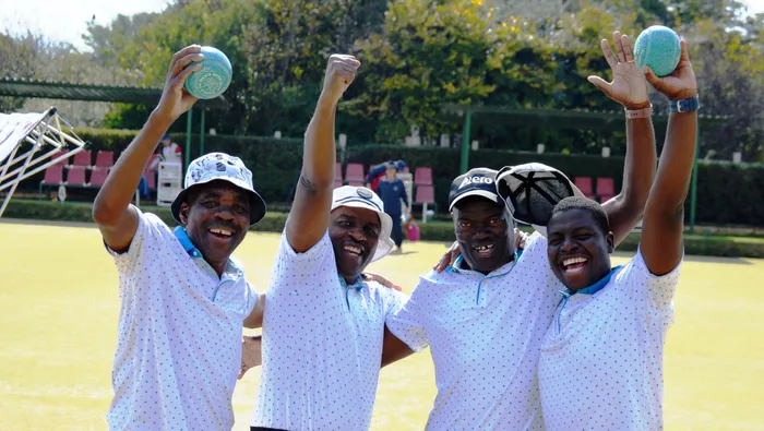 Morgan Muvhango, Sipho Velempini, Abram Masemola and Nomatter Muvhango playing under the Discovery BC (Sables) flag celebrate their historic BSA Fours title.