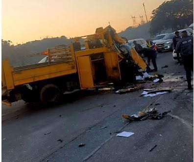 Tragedy strikes on M25 as run-away truck and bus collide, leaving one dead and dozens injured