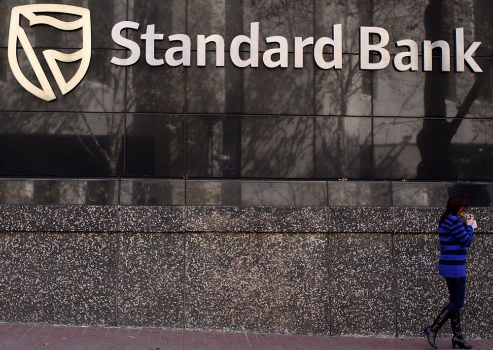 Standard Bank sells London stake