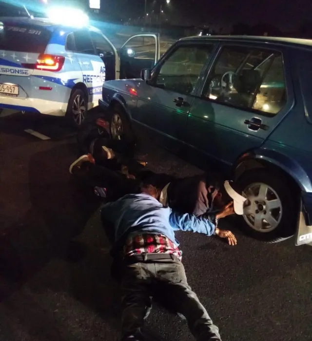 Suspects on the ground.