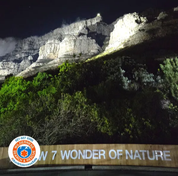 Night falls over Table Mountain as WSAR rescuers worked to safely guide a stranded Chinese tourist off the India Venster route on Saturday night.