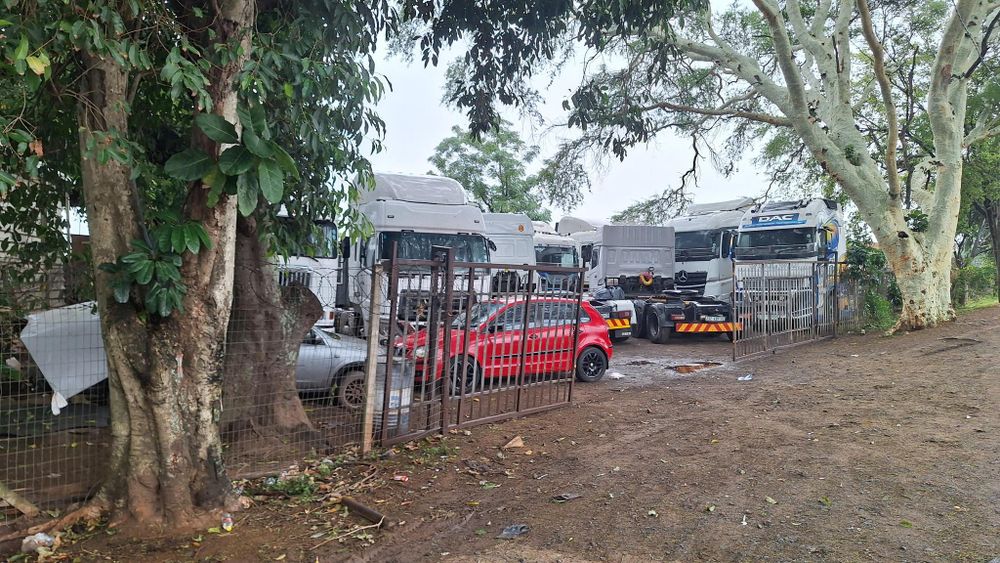 School property used as an illegal truck depot