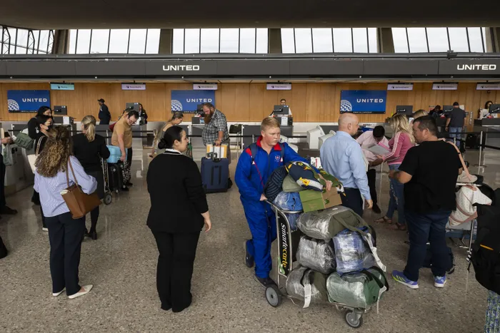 A group of Afrikaners from South Africa arrived at Dulles International Airport in 2025. 