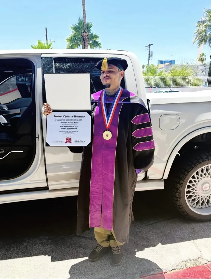 Chris Brown received an honorary doctorate in visual and performing arts.
