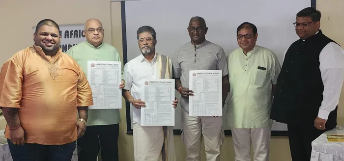 Trishalan Govender, from left, Professor Purshottama Reddy, Guru Shankaran, Sydney Govindsamy, Pundit Lokesh Maharajh and Judge Ranjiv Nirghin worked together to compile the calendar. 