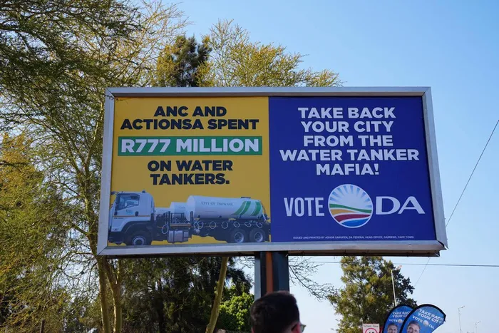 The DA’s billboard in Hammanskraal accuses the ANC and ActionSA of spending R777 million on water tankers. 
