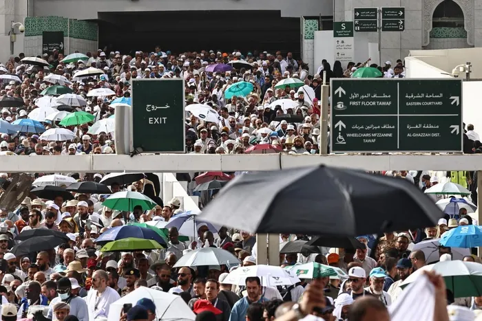 Muslim worshippers leave the Grand Mosque complex after offering prayers in the holy city of Mecca, ahead of the annual Hajj pilgrimage. Over 1.5 million pilgrims have arrived in Saudi Arabia from outside the kingdom for hajj, according to a Saudi official, exceeding the number of international visitors last year despite the war in the Middle East.
