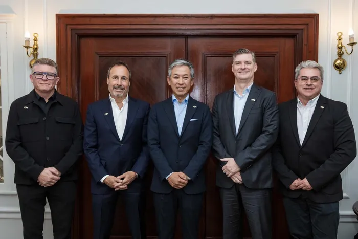 Marking the transfer of ownership of TiAuto Investments to Marubeni Corporation of Japan, from left to right: Alex Taplin, CEO, TiAuto; Eric Kump, MD, Alterra Capital Partners; Kazumichi Watanabe, COO, Marubeni Corporation, Lifestyle Division; Jacci Myburgh, Co-Head, Old Mutual Private Equity; and Charl Drury, CFO, TiAuto Investments.