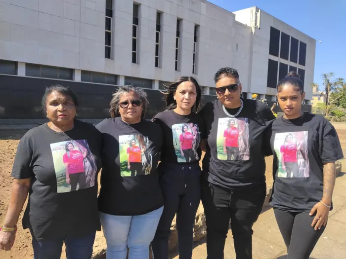 Rajpaul’s family members, from left, Doreen Govender, Priscilla Mahabeer, Sameera Ahmed, Sasha Rajpaul, and Katelynn Naidoo, outside the Durban Regional Court at the start of trial this week.