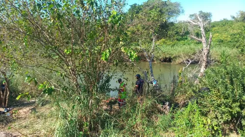 Police recover two bodies after vehicle plunges into Crocodile River; search continues for third