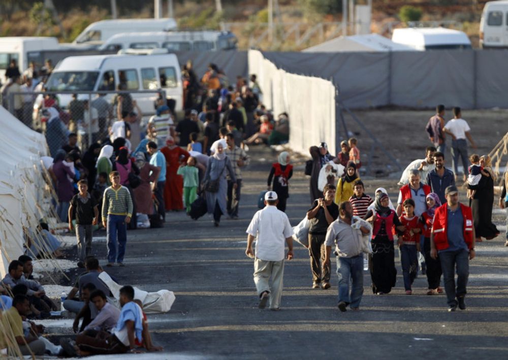 Syrian refugees flee to Turkey