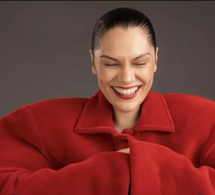 Jessie J triumphs over cancer in emotional announcement.