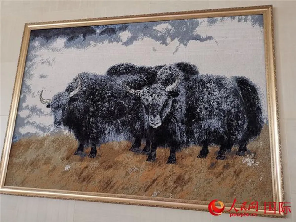 a Tibetan carpet produced by Shengyuan Carpet Group Co., Ltd., a Tibetan carpet manufacturing company based in Xining, northwest China’s Qinghai province. (People’s Daily Online/Yang Qian)