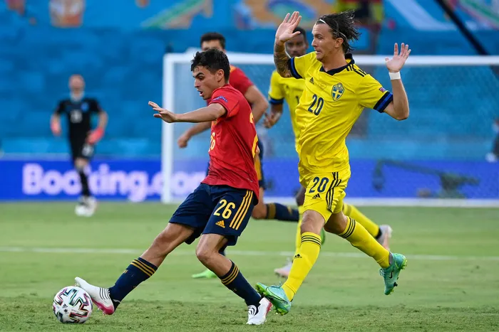 Spain's Pedri, left, has great football intelligence and composure that belie his age.