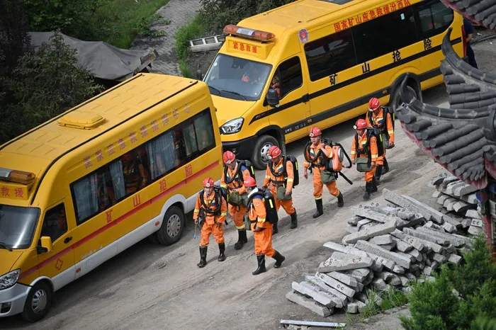 Rescue workers arrive to carry out rescue operations following a gas explosion at the Liushenyu coal mine in Changzhi, in northern China's Shanxi province on May 23, 2026.