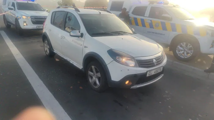 The 23-year-old was shot in his car 