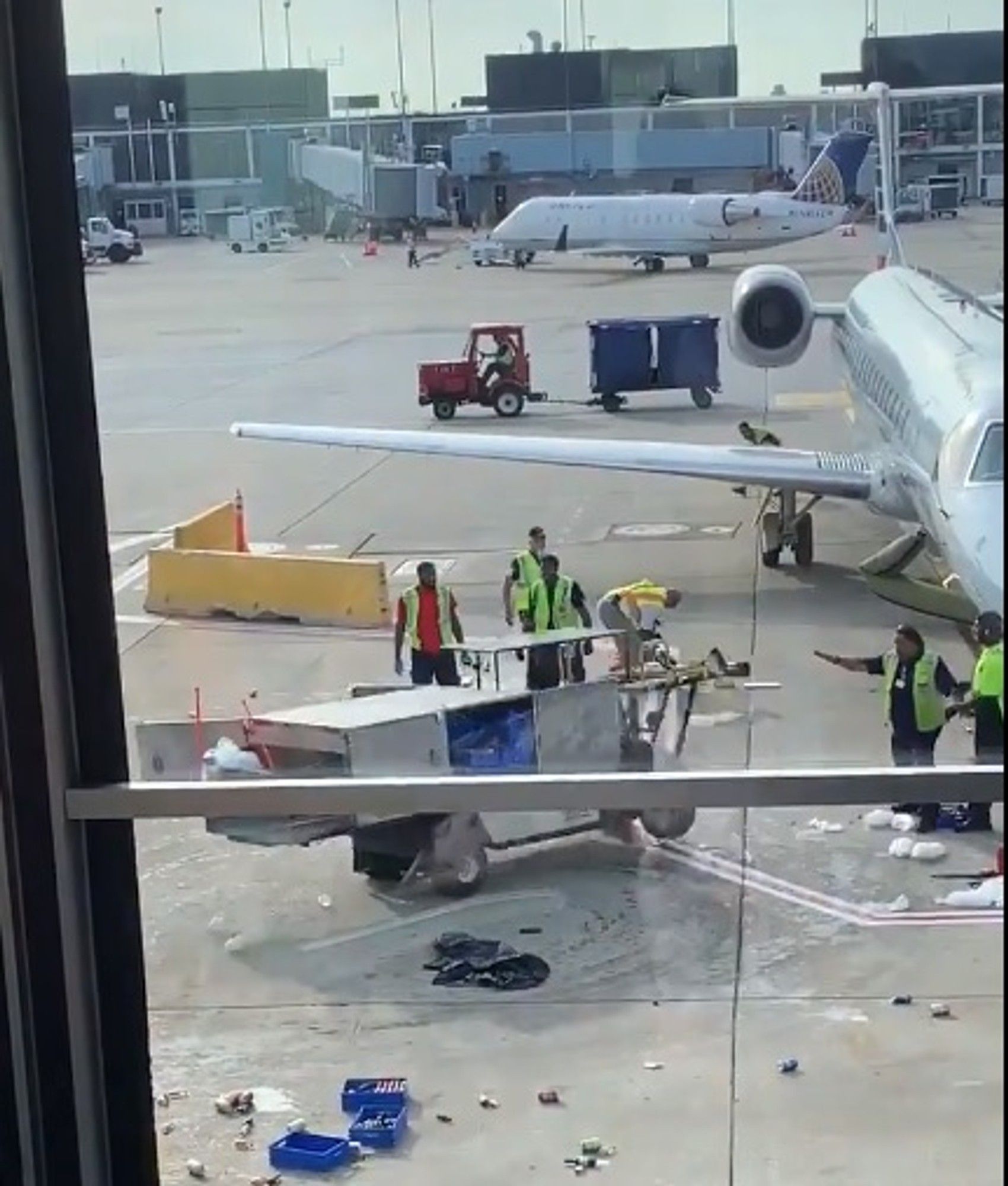 WATCH Airport catering cart malfunctions and nearly crashes into plane