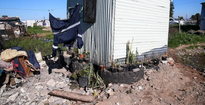 Some residents in Covid informal settlement had to find ways to cope with flooding. Picture: Leon Lestrade/African News Agency/ANA