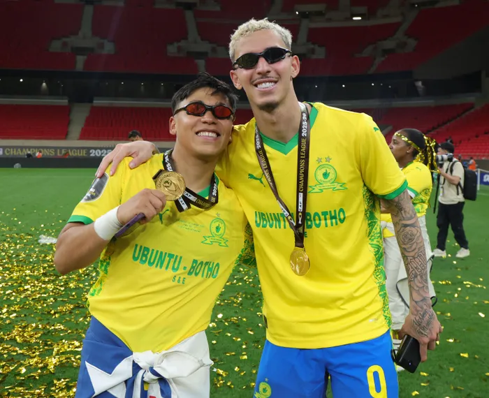 SOUTH AMERICAN CONNECTION: Marcelo Allende and Arthur Sales of Mamelodi Sundowns celebrate with their CAF Champions League gold medals in Rabat on Sunday. 