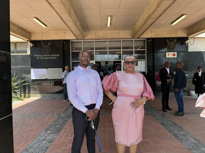 The fraud case against eThekwini's former mayor, Zandile Gumede, has been postponed. On the left is her spokesperson, Siphelele Jiyane. 