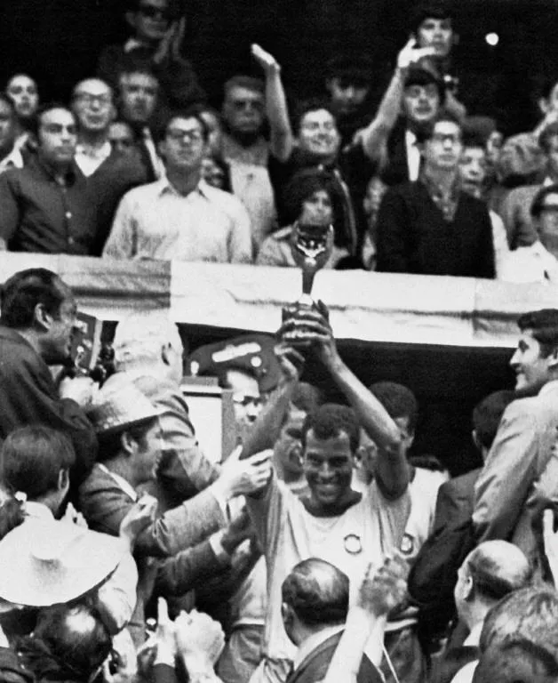 Brazilian captain and defender Carlos Alberto holds aloft the Jules Rimet Cup. Brazil were the last team to win the trophy. Photo: AFP