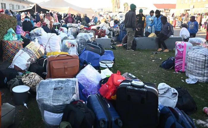 Many foreign nationals continue to camp outside and near the Epping repatriation centre in Cape Town. 