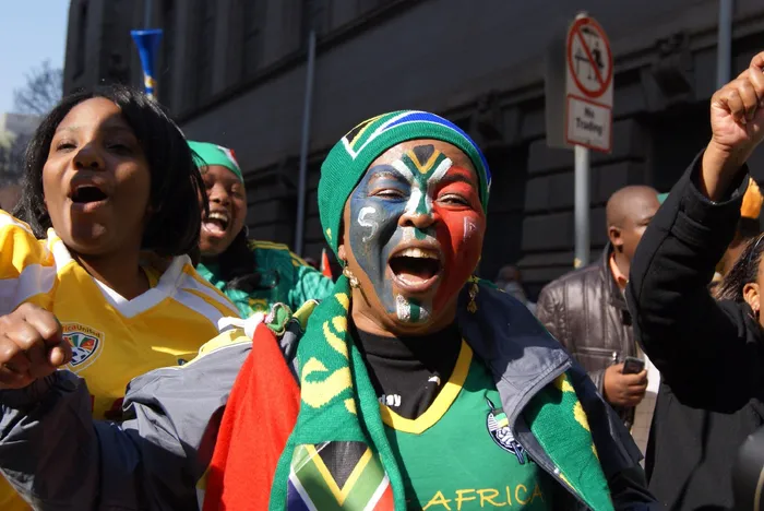 Bafana Bafana is set to make a historic appearance at the FIFA World Cup, with South Africa uniting in support as they face Mexico in the opening match, showcasing legendary talent and overcoming past challenges. Seen here: Bafana supporters at the team sendoff. Picture:Mandisa Ledwaba
