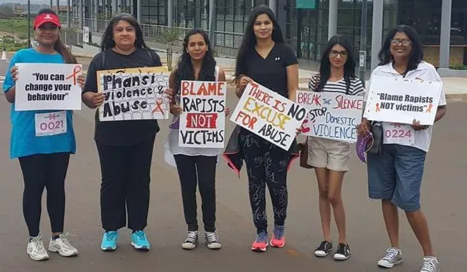 Dr Lubna Nadvi, chairperson of the Advice Desk for the Abused, second from left, with members at a gender-based violence awareness walk. 