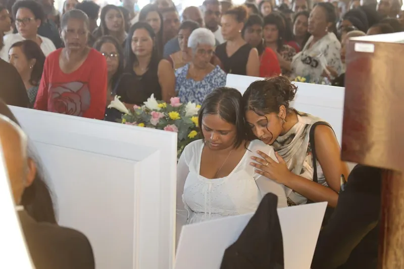 In pictures: loved ones unite to mourn seven family members in heartbreaking funeral