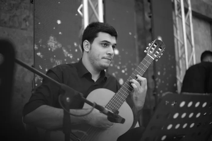 Palestinian composer Mahmoud Abuwarda was displaced from Gaza after Israeli attacks.