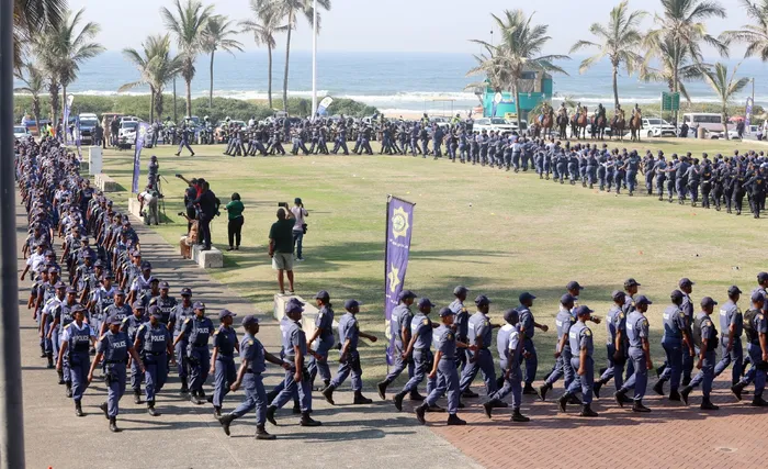 Troops prepare for deployment at the Durban amphitheatre, ensuring public safety during the upcoming demonstrations.